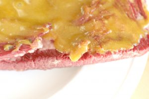 close up of corned beef with glaze
