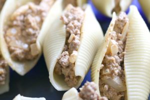 taco stuffed shells - close up of shells and meat filling