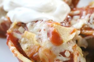 taco stuffed shells with melted cheese and toasty tortilla chips